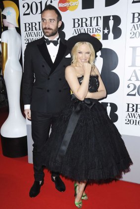 Kylie Minogue and her fiance Joshua Sasse attend the BRIT Awards 2016.