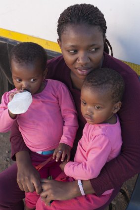 Ketani's daughter, Bulelwa, with her twin girls.
