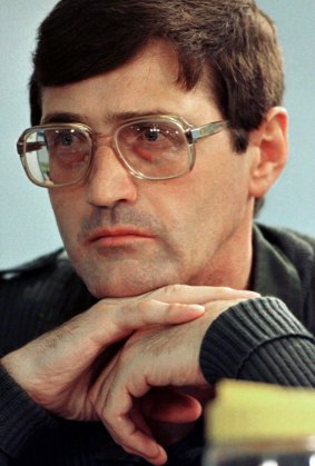 Apartheid death-squad leader Eugene de Kock listens to questions put to him by lawyers at the special public hearing of South Africa's Truth and Reconciliation Commission in Johannesburg in 1998. 