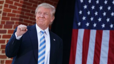 Republican presidential candidate Donald Trump arrives at a campaign rally.