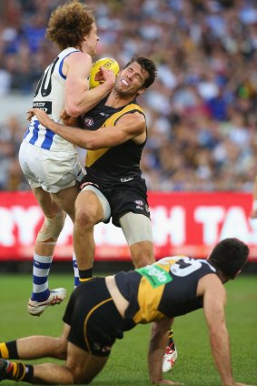 Third time unlucky: North Melbourne's Ben Brown marks in front of Richmond's Alex Rance during the weekend's elimination final.