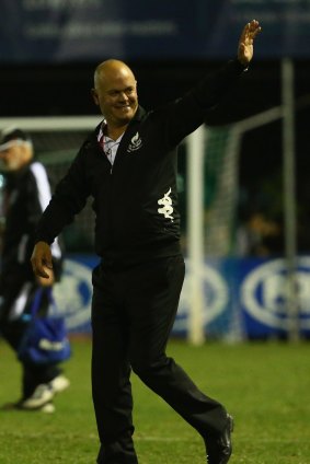 Bentleigh coach John Anastasiadis waves to the crowd after his side defeated Adelaide City on Wednesday.