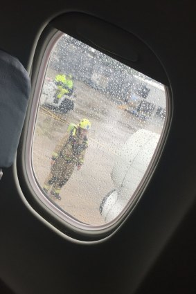 Passenger Alyce Fisher's photograph of emergency services outside the plane.