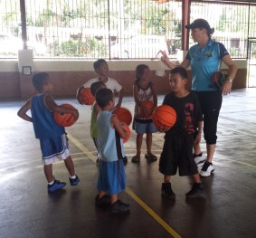'Barefoot with a basketball and a smile, that's all what mattered': Carrie Graf was in Micronesia.