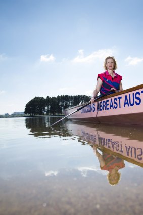 Passionate about breast cancer awareness: Narelle Powers in the Dragons Abreast Australia dragon boat at the Lotus Bay, Southern Cross Yacht Club in Mariner Place, Lotus Bay, Yarralumla.