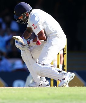 Murali Vijay reacts after taking one to the body late on day three.