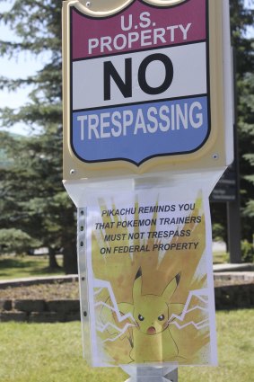A sign at the National Weather Service in Anchorage, Alaska, informs "Pokemon Go" players that it's illegal to trespass on federal property. 