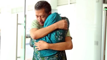 A still from the Indonesian government-backed video shows Heru Kurnia returning to Indonesia and his family. 