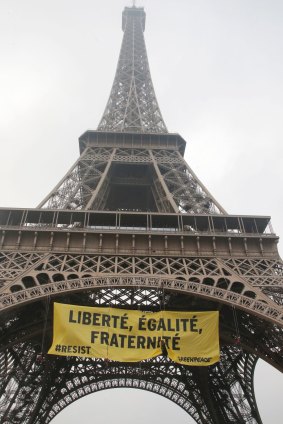 A dozen Greenpeace activists were arrested during the protest at Paris' landmark.