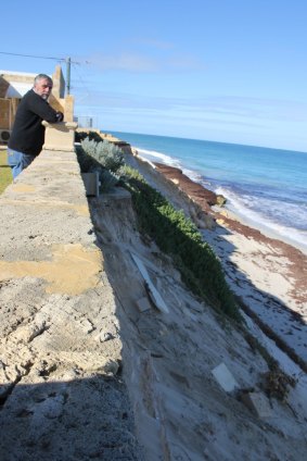 Seabird Progress Association president Garry Thomas surveys the view from resident Jim Batalin's wall.