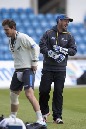 New Zealand's Luke Ronchi (right) laughs as he stands alongside teammate BJ Watling during a nets session.