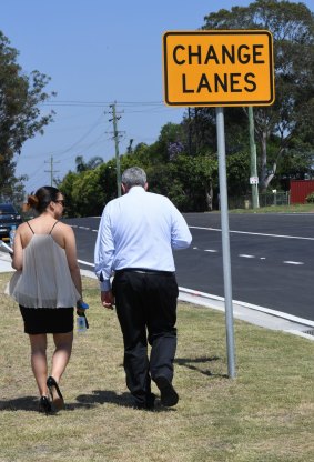 Roads Minister Duncan Gay and one of his advisers in Sydney's north west on Wednesday.