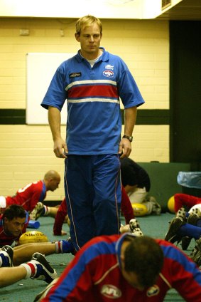 Justin Cordy oversees the Bulldogs warm up in 2005.