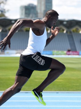 Striding out: Usain Bolt training at Lakeside Stadium.