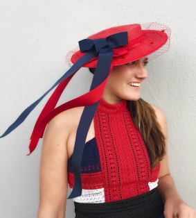 Stephanie Davies of Kingston is all set for the Black Opal Stakes with her striking boater from Canberra milliner Christine Waring