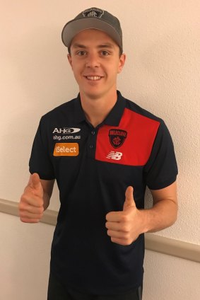 Jake Lever shows his delight after being traded while holidaying overseas.