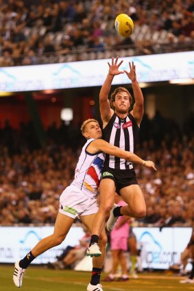 Magpie in flight: Tim Broomhead gets ahead of  his opponent. 