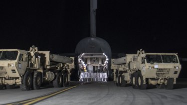 The first components of the High Altitude Area Defence (THAAD) missile defence system arrive at the Osan Air Base outside Seoul.