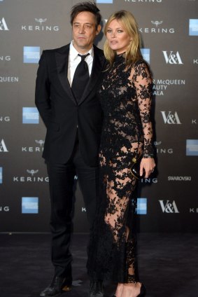 Barely there: Jamie Hince and Kate Moss at the <i>Alexander McQueen: Savage Beauty</i> exhibition in London.