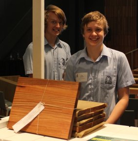 Students from Frankston High School's 2015 cohort with their recycled hardwood chopping boards.