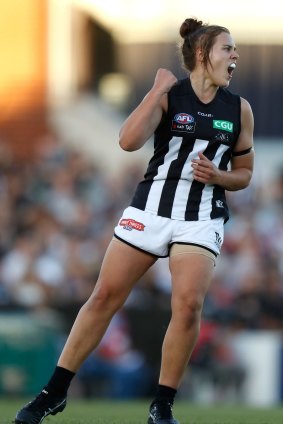Collingwood's Jasmine Garner celebrates kicking a goal, the first of the match and her team's only major score for the night.