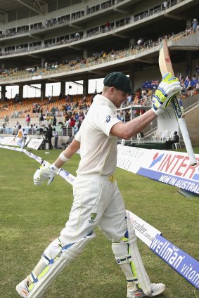 Australia's Steve Smith leaves the arena of Jamaica's Sabina Park arena on finishing 135 not out on day one of the second Test against the West Indies.