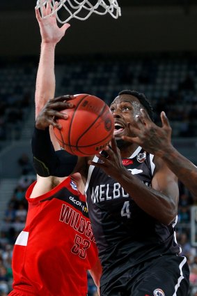 Driving to the basket during the round three NBL match between Melbourne United and the Perth Wildcats at Hisense Arena.