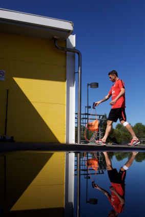 On reflection: Western Sydney Wanderers player Scott Neville arrives for training.