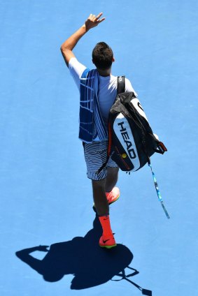 Bernard Tomic exits centre stage after his first-round win on Monday at Melbourne Park. 
