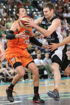 Coming through: Melbourne United’s Mark Worthington on the way to the basket against the Cairns Taipans.