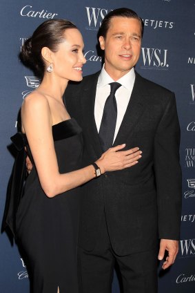 Split: Angelina Jolie Pitt and Brad Pitt in happier times. 