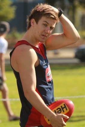 Unlucky parting: Melbourne's Jack Trengove in 2013.