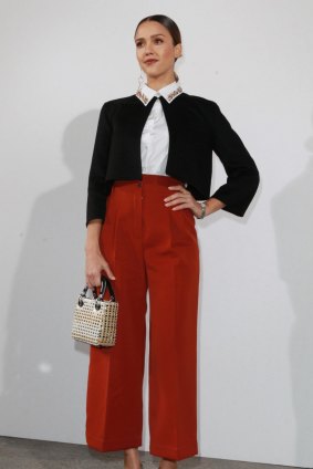Jessica Alba's watch adds a very pleasing little punctuation mark to her fashion statement at the Christian Dior show.   