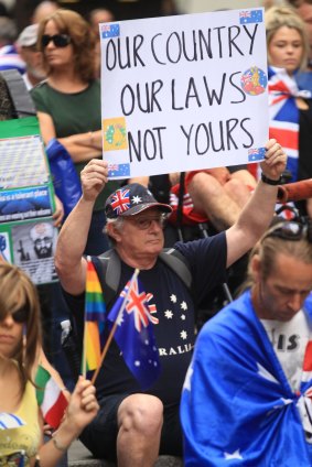 Many protesters had draped themselves in Australian flags or wore flag-decorated clothes.