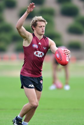 Will Hams of the Bombers kicks for goal during an Essendon training session on Friday.