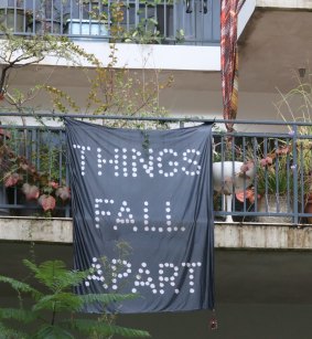 A banner unfurled from the second floor of the family home. 