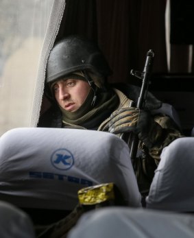A Ukrainian serviceman who fought in Debaltseve on a bus  near Artemivsk on Wednesday. 