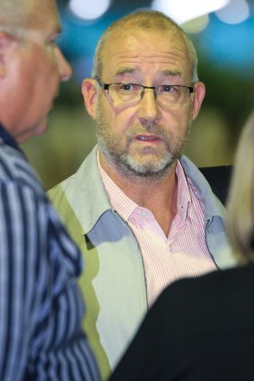 Les Jackson, father of Thomas Jackson, who was critically injured in the alleged backpacker hostel stabbing attack in Home Hill, south of the Queensland city of Townsville, arrives at Townsville airport on August 25, 2016.