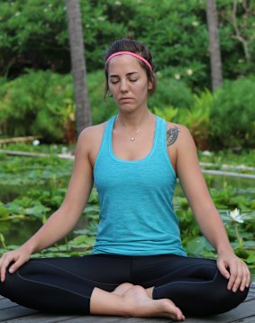 The morning sessions take place on the deck beside the lily pads.