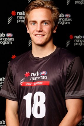 Harry Morrison poses during the NAB AFL draft state combine headshot session at Etihad Stadium.