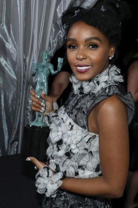 Janelle Monae backstage with her SAG award for outstanding performance by a cast in a motion picture for <i>Hidden Figures</i>.