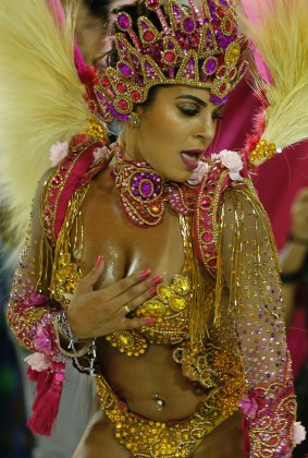 A performer from the Imperio Serrano samba school parades during Carnival celebrations at the Sambadrome in Rio de Janeiro.