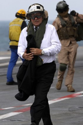 French Defence Minister Jean-Yves Le Drian onboard the aircraft carrier Charles de Gaulle.