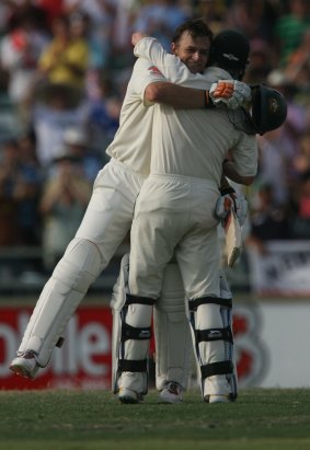 Adam Gilchrist celebrates after hitting a 57-ball century at the WACA.