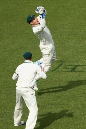 Peter Nevill of Australia takes a catch to dismiss Brendon McCullum on day one of the Third Test.