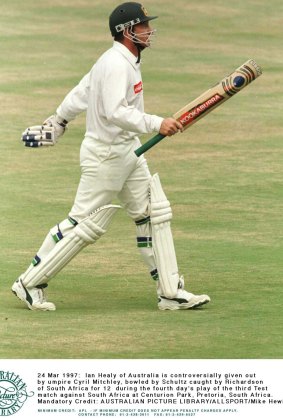 Ian Healy marches of in disgust after controversially given out by umpire Cyril Mitchley in 1997.