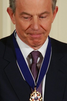 Tony Blair with the Presidential Medal of Freedom after he was decorated by George W. Bush in January 2009.