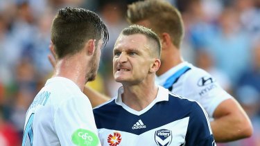 Connor Chapman of City and Besart Berisha of Victory exchange words during a derby last season.