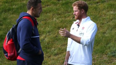 By royal appointment: Prince Harry gives Burgess some tips at training.
