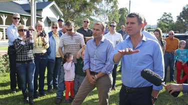 NSW Premier Mike Baird (near microphone) and Planning Minister Rob Stokes during a visit to Bulga in April.